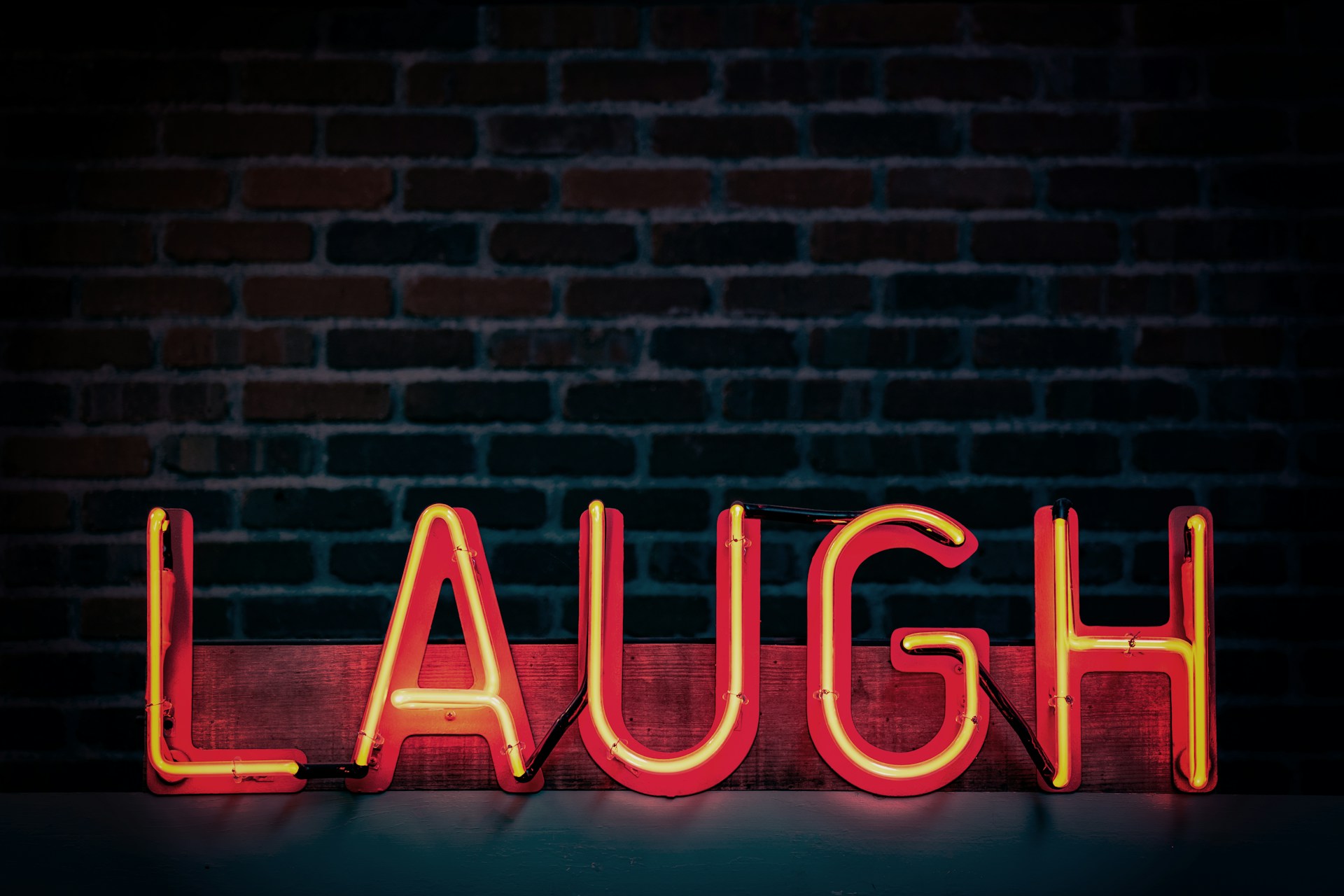 Laugh written in neon